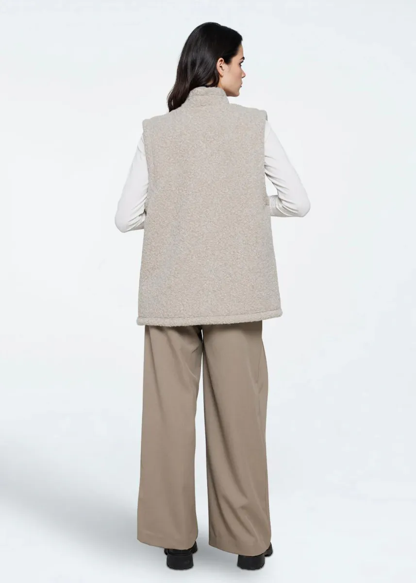 MOVES - KITTAH VEST 